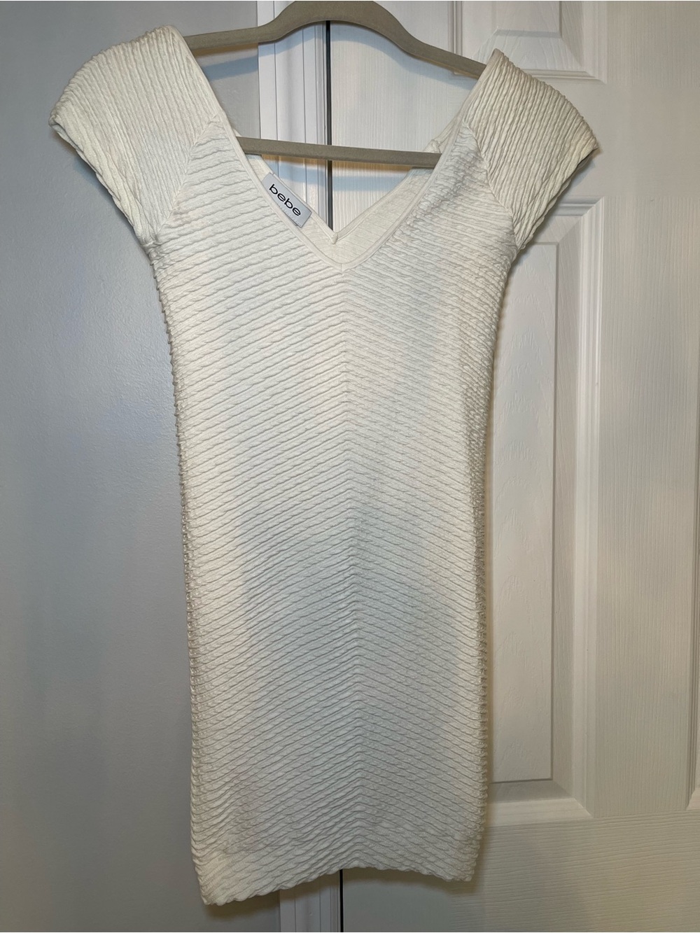 bebe Cream Ribbed V-Neck Mini Dress